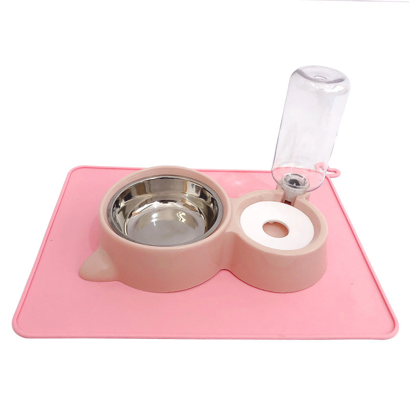Pet feeding and water station with pink mat on a white background