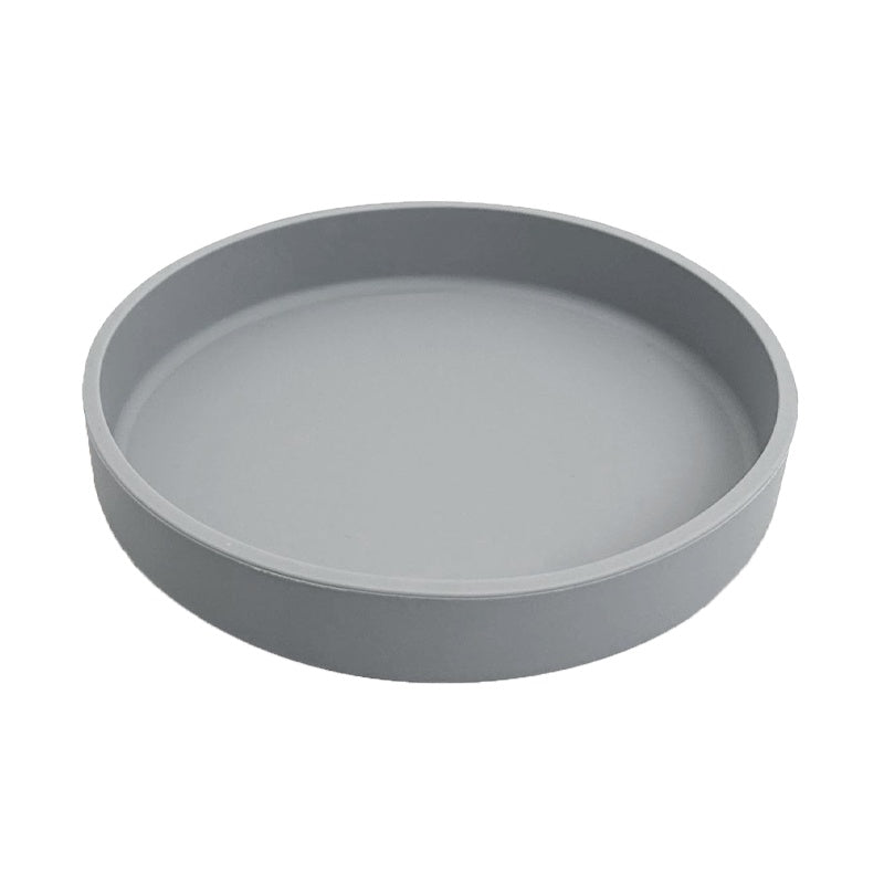 A round gray plastic tray or shallow dish with a smooth interior and slightly raised rim, shown on a plain white background.