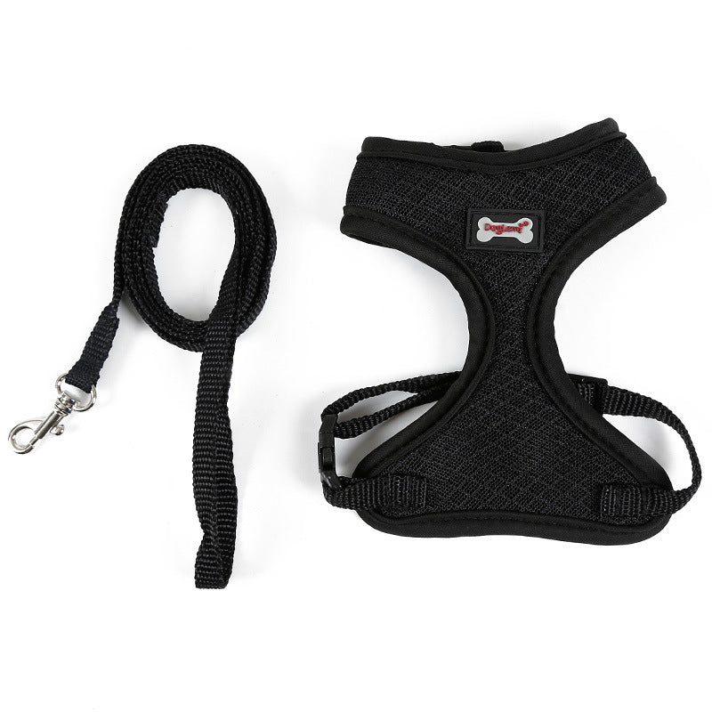 Black dog harness and leash set on a white background