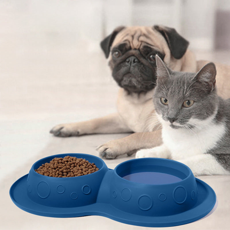 Blue pet feeding station with a pug and cat in the background
