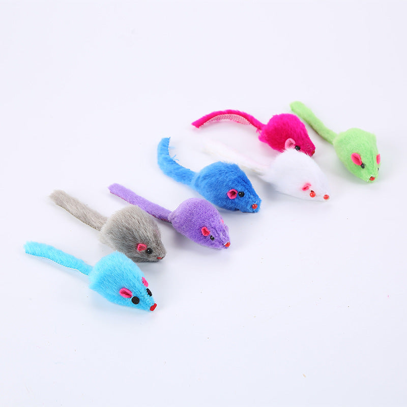 Colorful cat toys shaped like mice on a white background