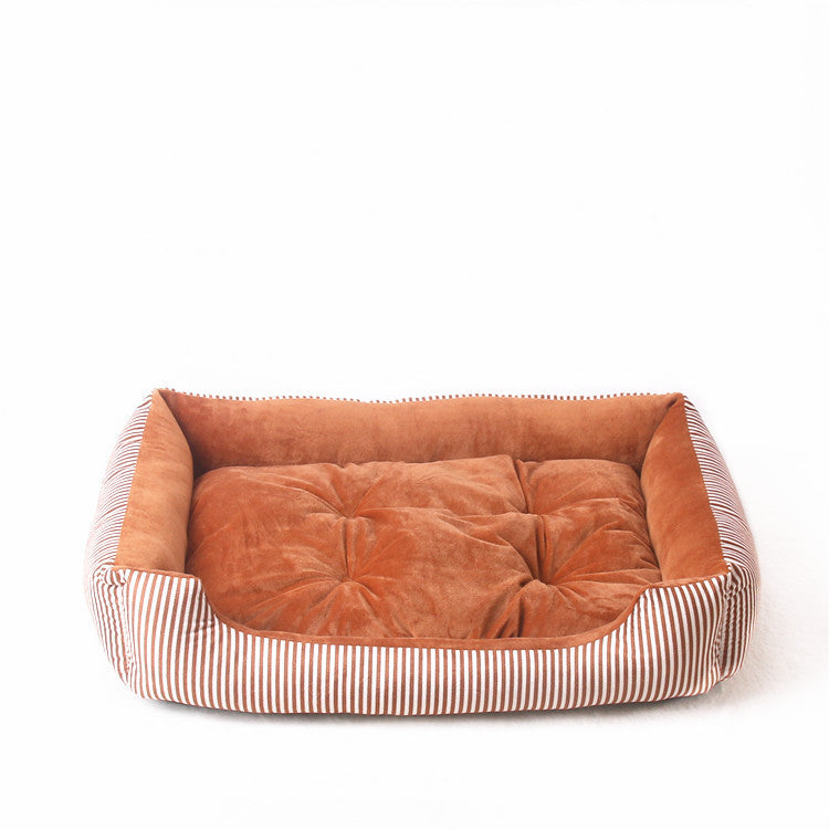 Dog bed with brown cushion and striped sides on a white background