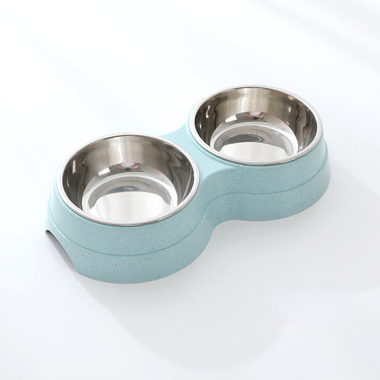 Pet bowl with two stainless steel compartments on a light blue base against a white background