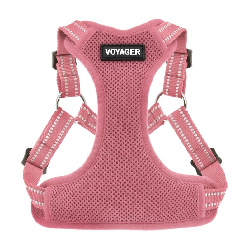 Pink mesh dog harness with adjustable straps, silver metal D-rings, and a black brand label reading 'VOYAGER' on a white background.