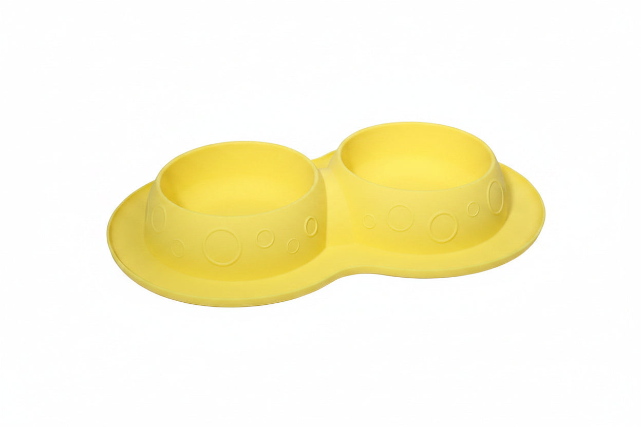 Yellow double-bowled pet feeder on a white background with 'PT 121C' text.