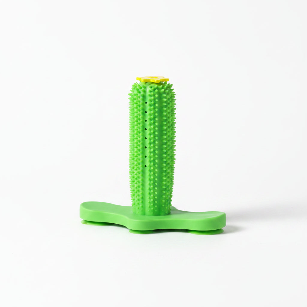 Green textured roller on a pink surface with a light blue background